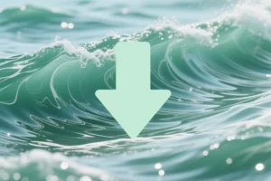 Large light green colored centered arrow with crashing green waves in the background.