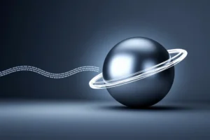 A large sleek metallic sphere made of brushed aluminum with a fast-moving trail of white light streaks.