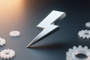 A sleek silver jagged lightning bolt resting diagonally across a smooth matte charcoal surface with brushed metal reflecting a soft warm amber.