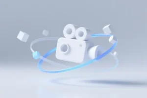 Floating white video camera icon suspended in mid-air stylized as a three-dimensional symbol of creation