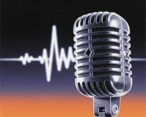 Vintage broadcasting microphone made up of a frosted glass and glowing fiber optic material.
